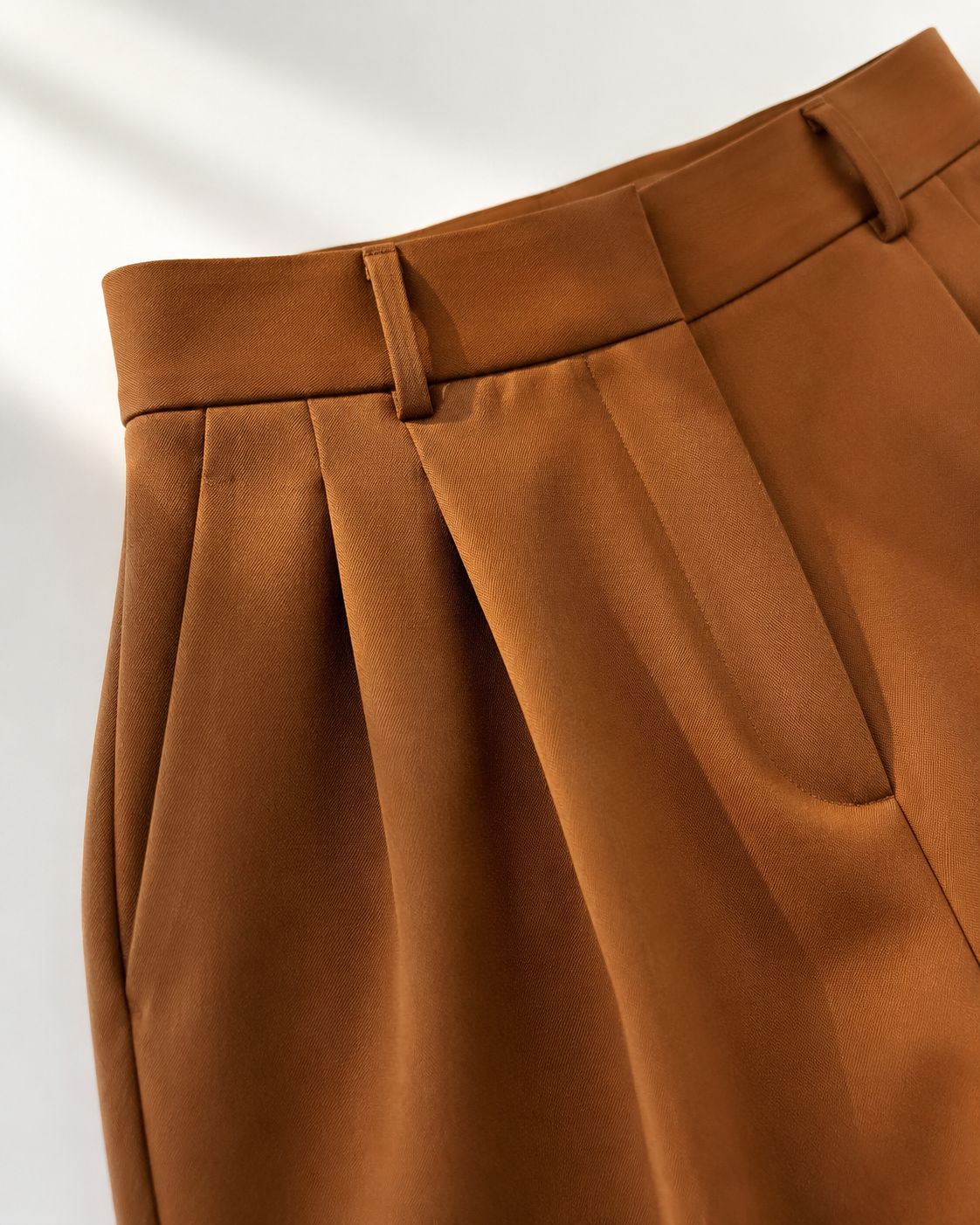 Vivia Tailored Trouser — Brown pleat and waistband detail