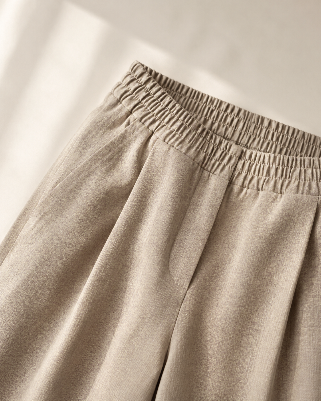 Vivia All-Day Trouser — high-waisted waistband detail with front pleats
